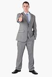 Businessman giving thumb up