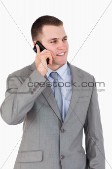 Close up of young businessman on the phone