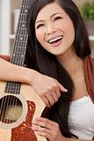 Beautiful Happy Chinese Oriental Asian Woman Smiling & Guitar