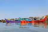 Colorful fishing boats moored at Kochin Backwater