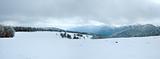 First winter snow and mountain panorama