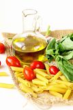 basil, pasta and olive oil - still life in the Italian style