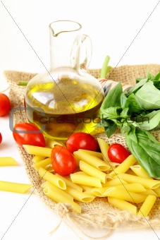 basil, pasta and olive oil - still life in the Italian style