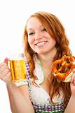 happy bavarian dressed girl with beer and pretzel