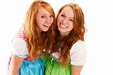 two happy bavarian redhead women