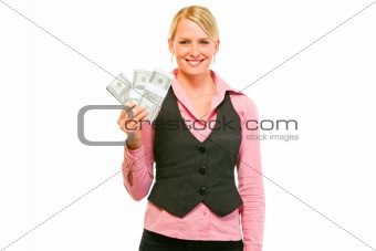 Smiling modern business woman with packs of dollars
