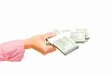 Female hand holding packs of dollars
