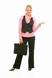 Modern business woman with briefcase showing something on empty palm
