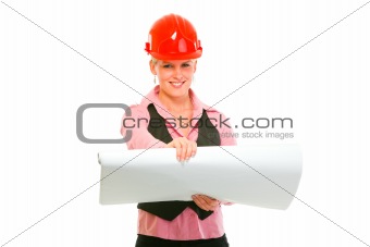 Smiling modern architect woman with open flip chart 
