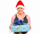 Happy modern business woman in Santa Hat with present box
