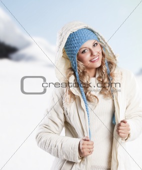 blue hat on a blond girl