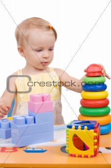 Baby girl playing pyramid