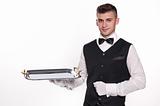 Haughty waiter holding an empty tray to place your product