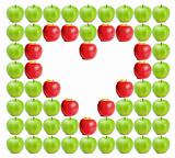 Green wet apples with red apples shaping a heart in between
