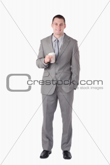Portrait of a businessman holding a cup of tea