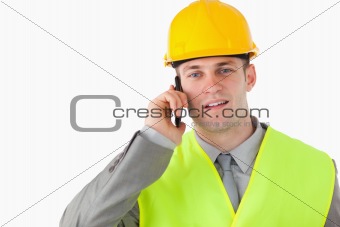 Builder using his cellphone