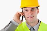 Close up of a builder making a phone call