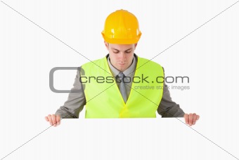 Builder looking at a blank panel