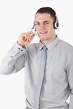Portrait of a smiling assistant using a headset