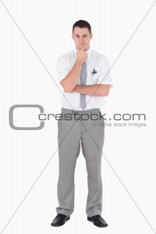 Portrait of an office worker with the hand on his chin