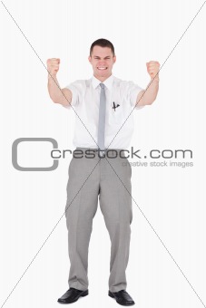 Portrait of a successful salesperson with fists up