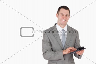 Businessman working with a calculator