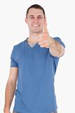 Portrait of a smiling man with the thumb up