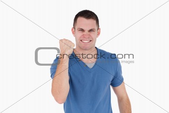 Smiling man with the fist up