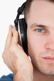 Close up of a man listening to music