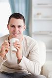 Portrait of a man having a coffee