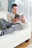 Man relaxing with a book