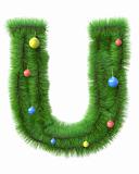 U letter made of christmas tree branches