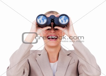 Joyful businesswoman predicting future success through binocular