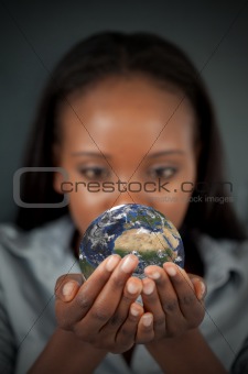 Woman holding the Earth