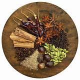 Mixed Spices on a Wooden Chopping Board