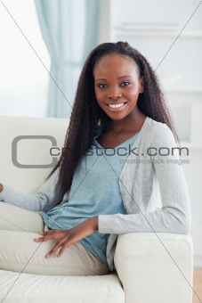 Close up of woman relaxing on sofa