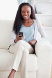 Woman happy about text message