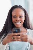 Close up of woman holding smartphone