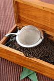 tea strainer with a fragrant black tea