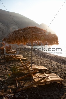 Sunbeds in Perissa, Santorini, Greece