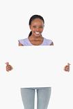 Close up of woman presenting placeholder on white background