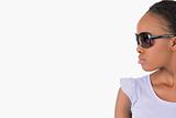 Close up of woman with sunglasses on white background