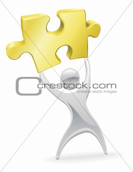 Metal mascot holding up a jigsaw puzzle piece