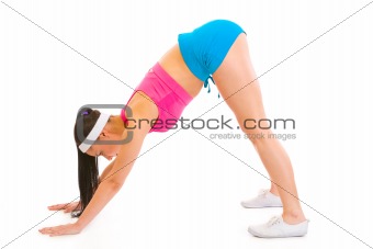 Fitness woman making exercise on floor
