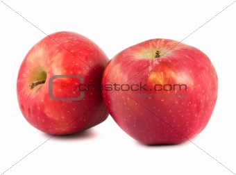 Two ripe red apples