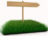 Wooden sign on Grass