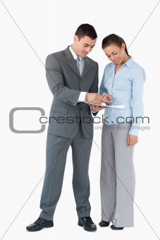 Business partner working on a deal against a white background