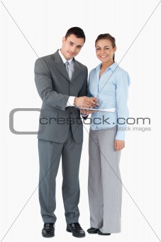 Business partner with clipboard against a white background