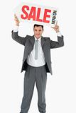 Businessman with sign above his head