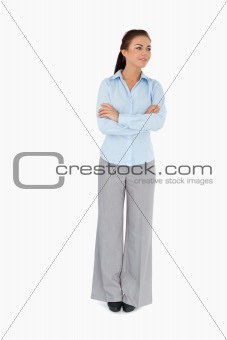 Young businesswoman with arms folded